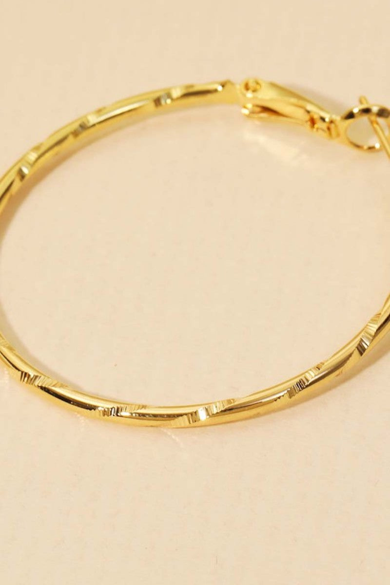 Gold textured hoops