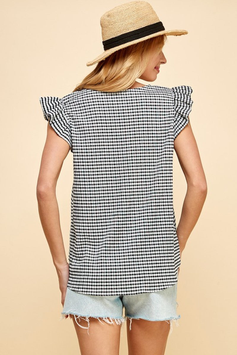 Cheryl's Checkered Blouse