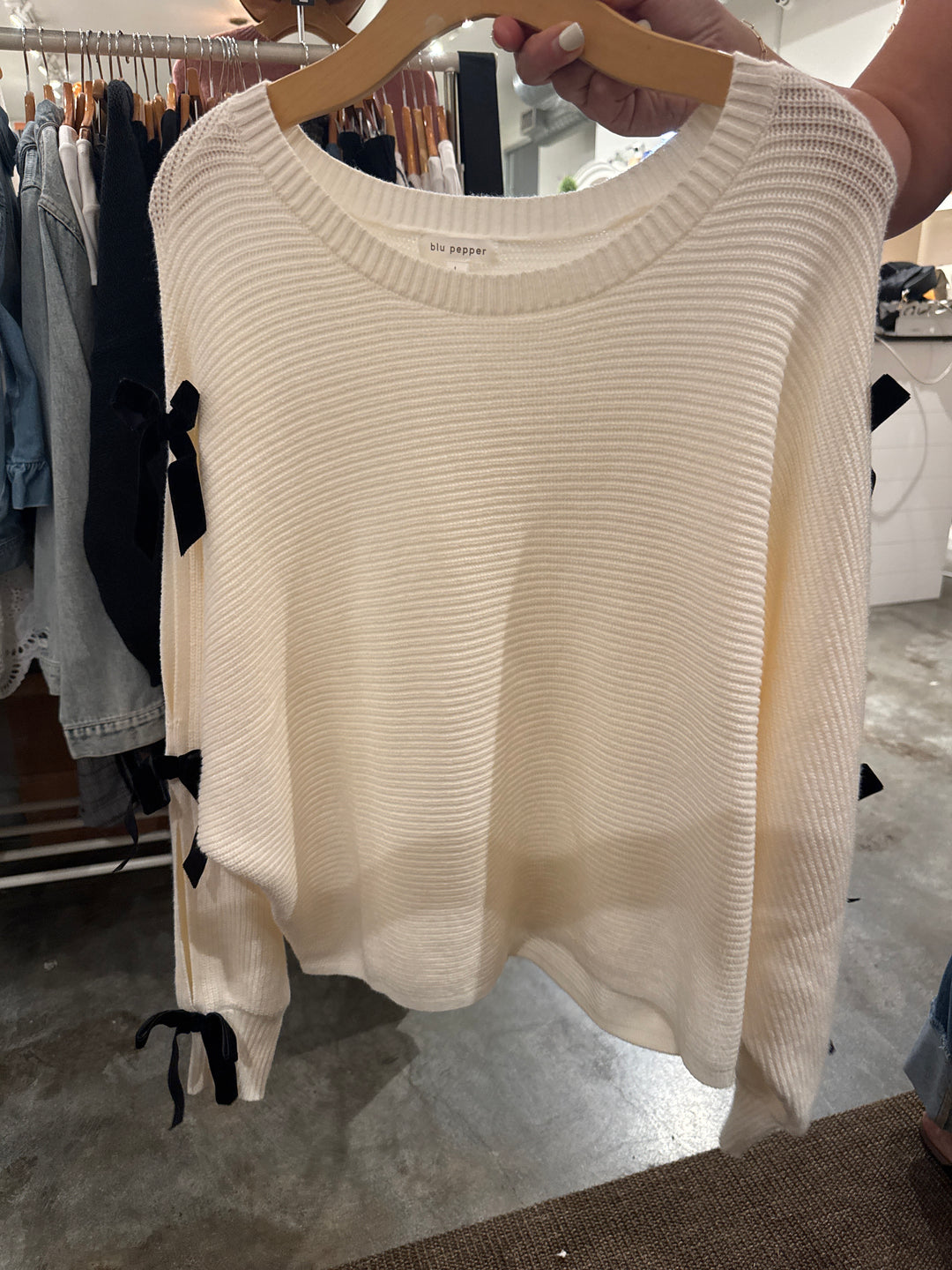 Sweater bow sleeve