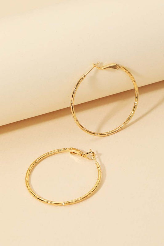 Gold textured hoops