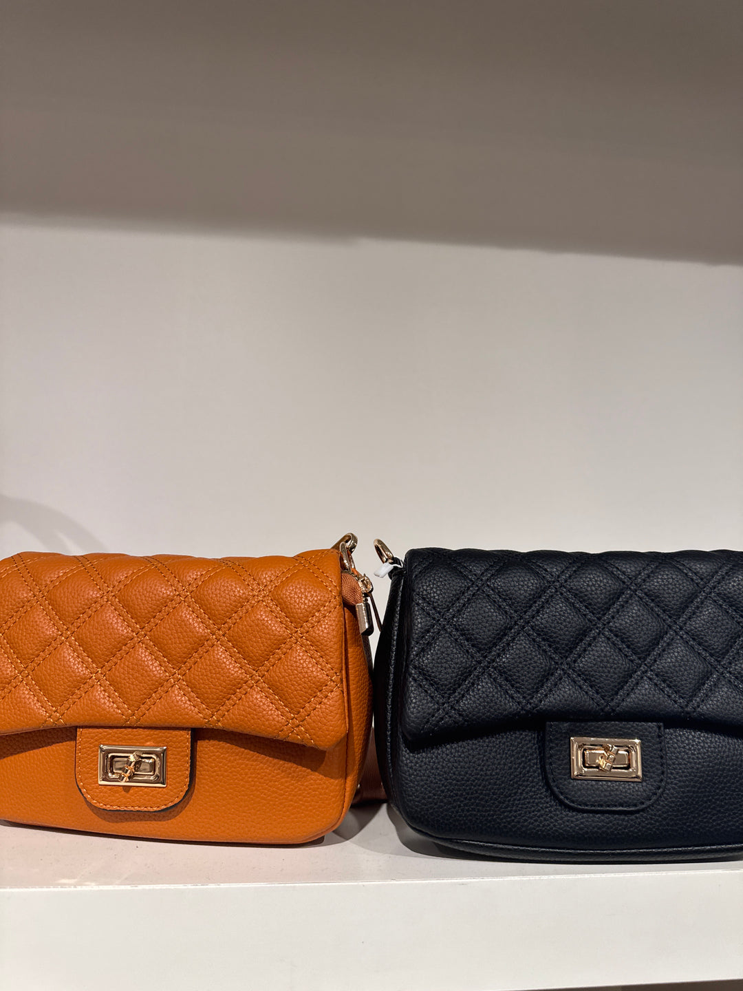 Cross stitched leather bag