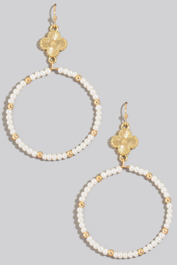 gold and pearl detailed earrings