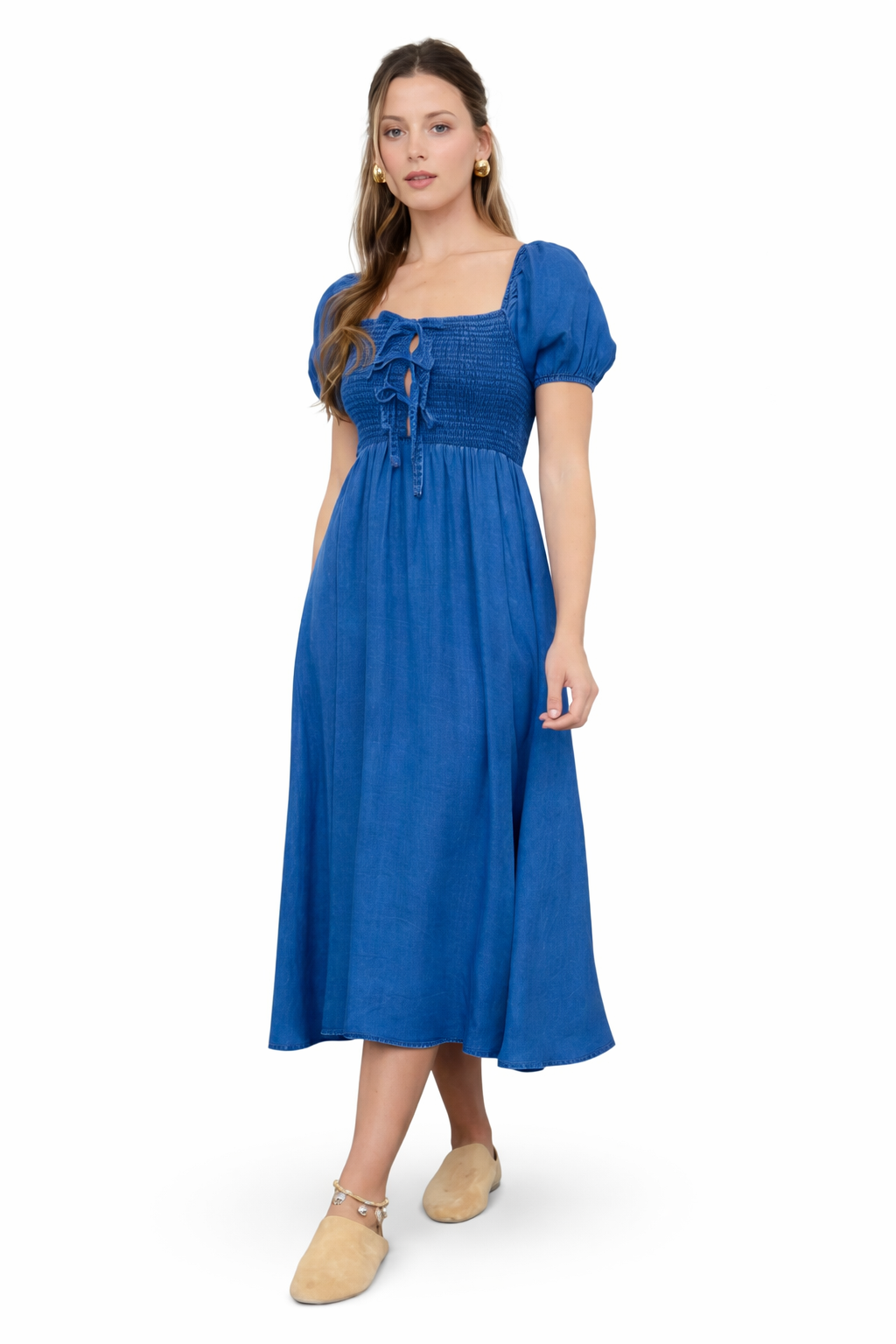 Chambray blue smocked midi dress with bow front detail and puff sleeves on white background